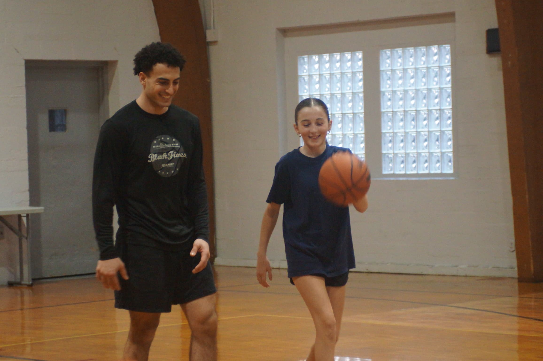Artemios Gavalas coaching a player